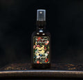 Image depicts a room spray bottle with floral print label.