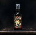 Image depicts a room spray bottle with floral print label.
