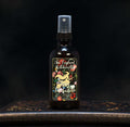 Image depicts a room spray bottle with floral print label.